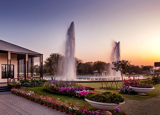 Enjoy the scenic view of the Twin Fountain at Central Park The Orchard 

