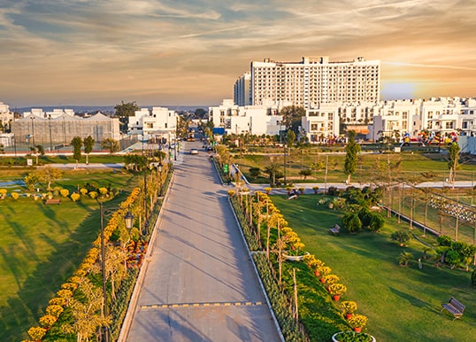 Sprawling Central Greens at Flower Valley The Orchard by Central Park

